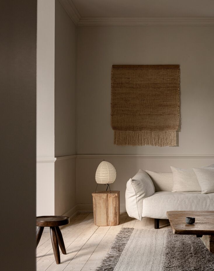 the norm architects soffio sofa, a charlotte perriand tabouret stool, and antiq 27