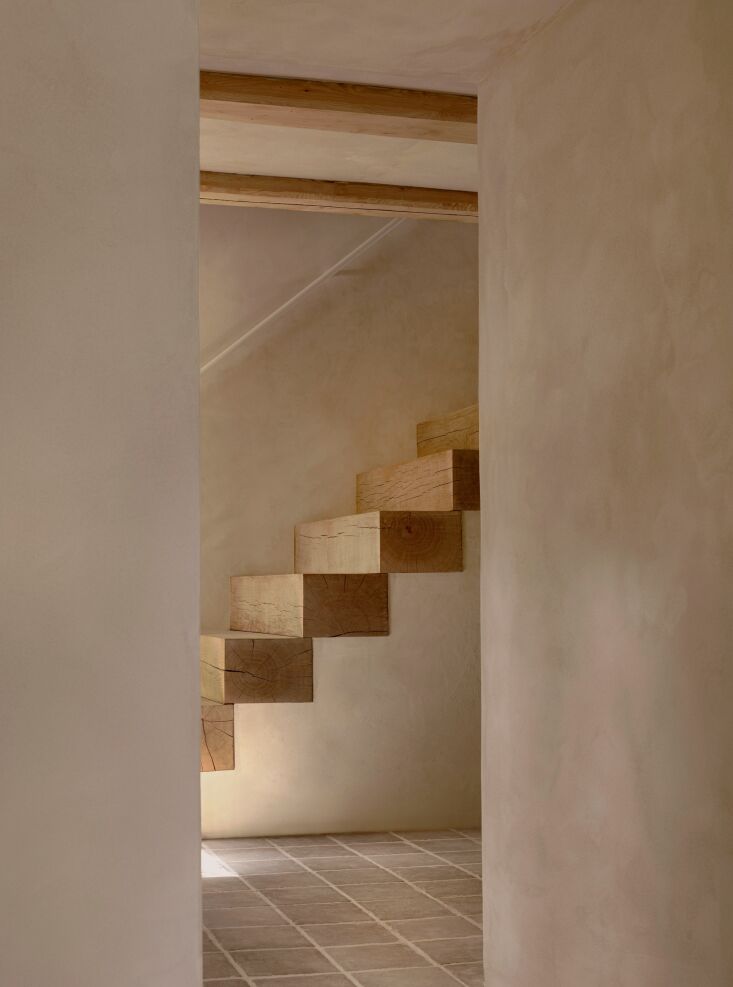 a staircase made of solid oak blocks freshly cut at a local sawmill, then mille 35