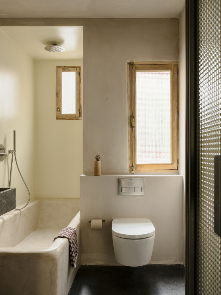 textured glass in the windows and door allows light to flow in while maintainin 26