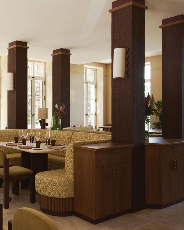 the restaurant dining room is equipped with custom banquettes upholstered in pa 21