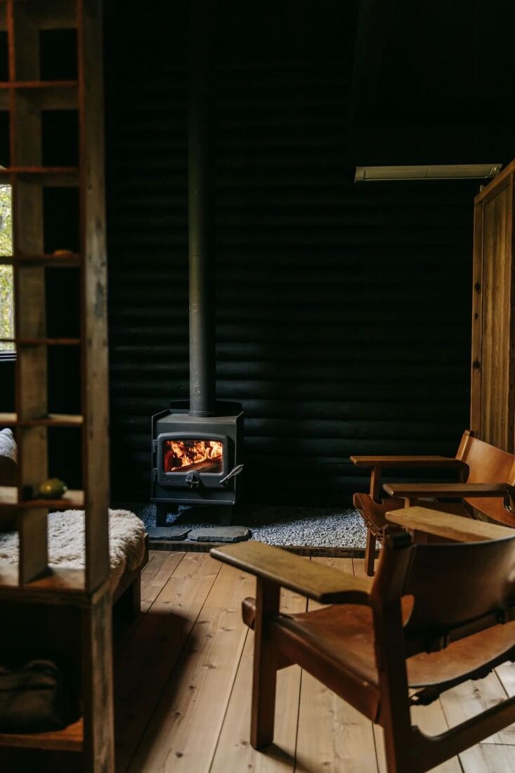 the living room centers on a small wood stove. 10