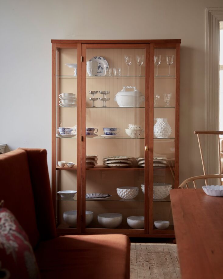 an impressive cherry vitrine from artilleriet interiors keeps old and new table 20
