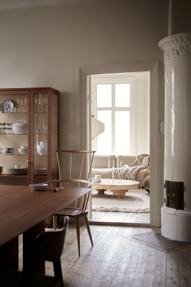 on the way into the living room, a de la espada kimble windsor chair and an ori 21