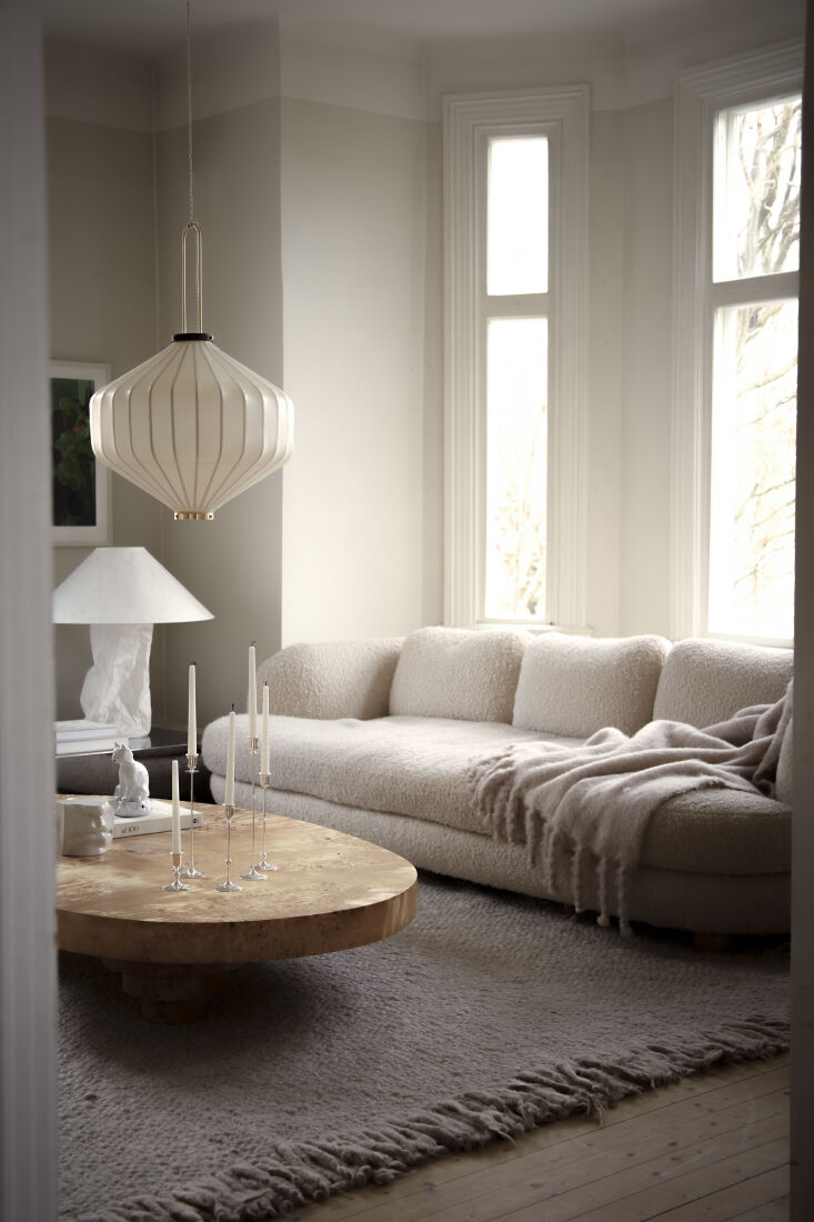 the sofa is the artilleriet interiors mamma sofa in awassi bouclé and the thro 23