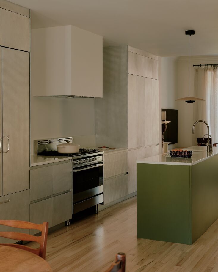in the middle of the first floor is the kitchen, with cabinets by reform. the g 20