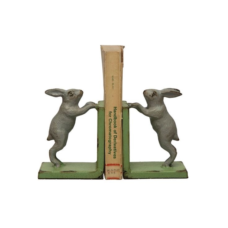 vintage looking cast iron rabbit bookends with a distressed finish are \$57 a s 26