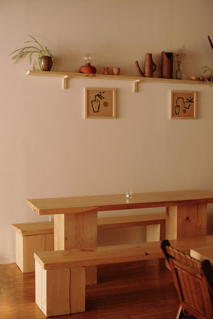 a judd like dining able and benches made of local pine and finished with a whey 18