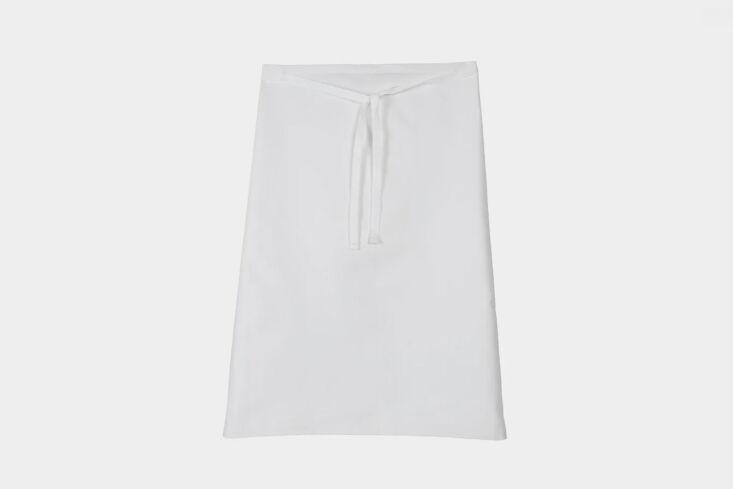 a timeless little apron to transport any cook into the kitchens of le corbon bl 26