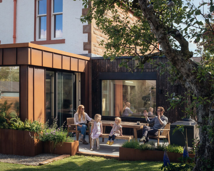 the strong connection to the garden facilitates lots of togetherness outside, t 27