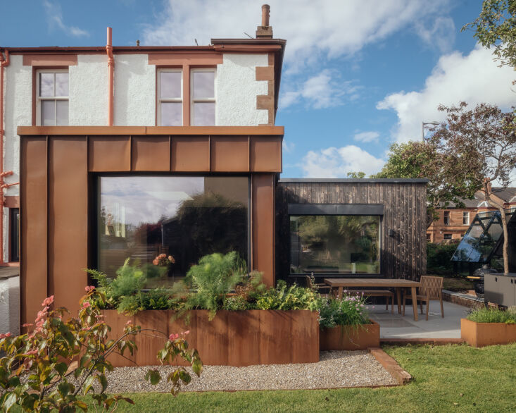 in the back, the couple asked loader monteith to design a two part corten steel 18