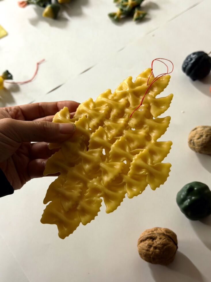 a large diamond shaped ornament made of layered farfalle. 22