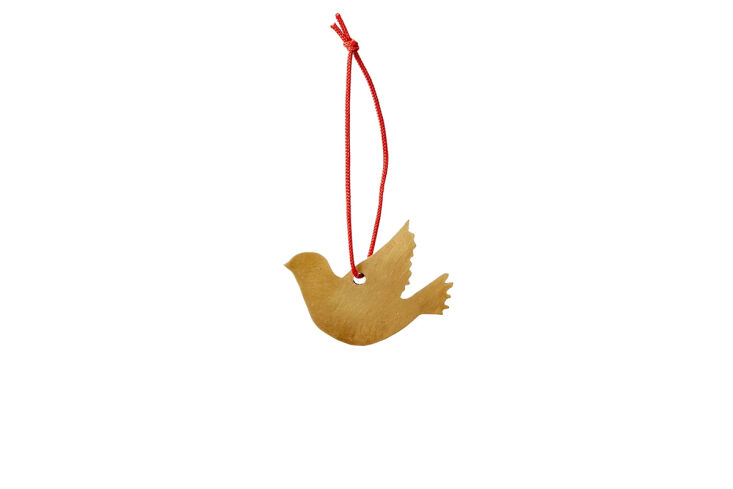 made from solid brass, fog linen\2\17;s simple bird can be hung in a win 22