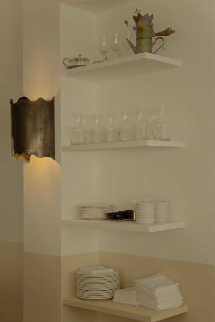 metal wall sconces designed by piccolo. 19