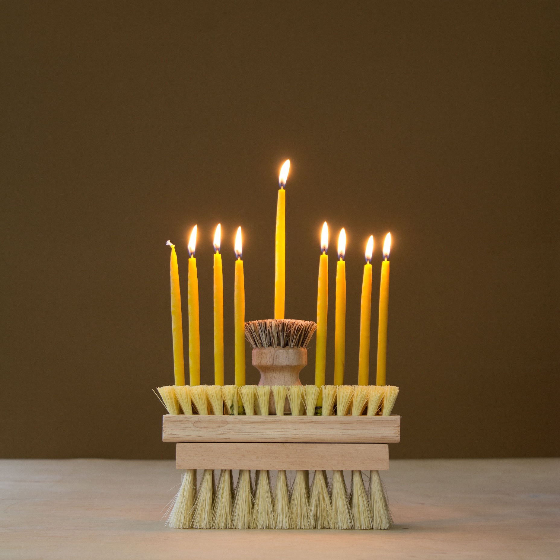 the scullery menorah—stack three scrub brushes and simply insert candles. pho 21