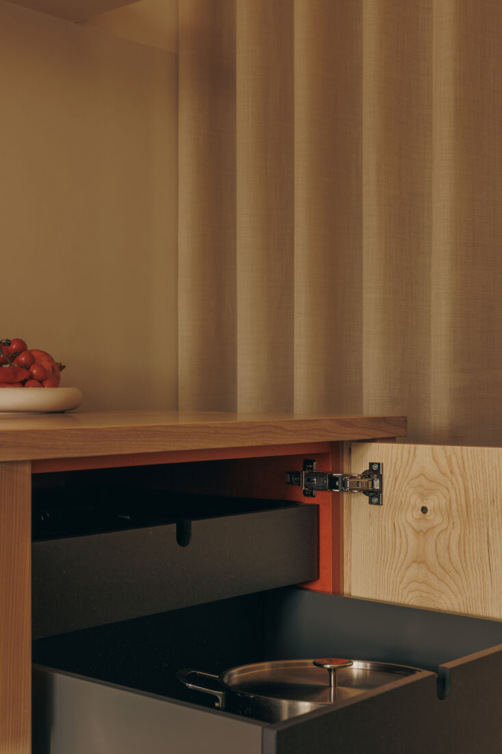 for the cabinet interiors, silvan studio utilized their extra valchromat, a thi 20