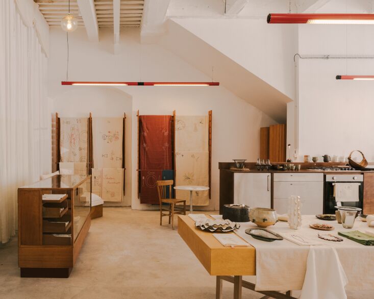 all furniture in the space, including hang racks, was designed by sarah and cus 22