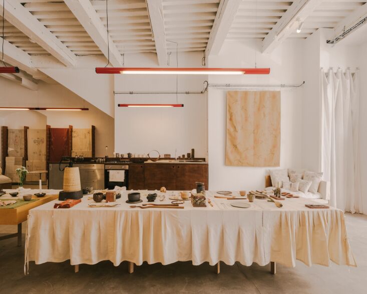the studio, at 7 rue villeneuve in marseille, is anchored with long dining tabl 17