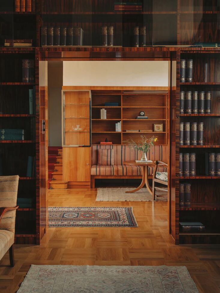 original bookshelf lined walls of the more social spaces in villa rezek were ca 17