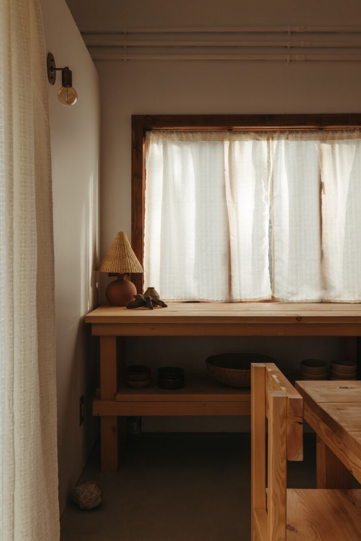 a look at the custom counters and chunky dining chairs. 19