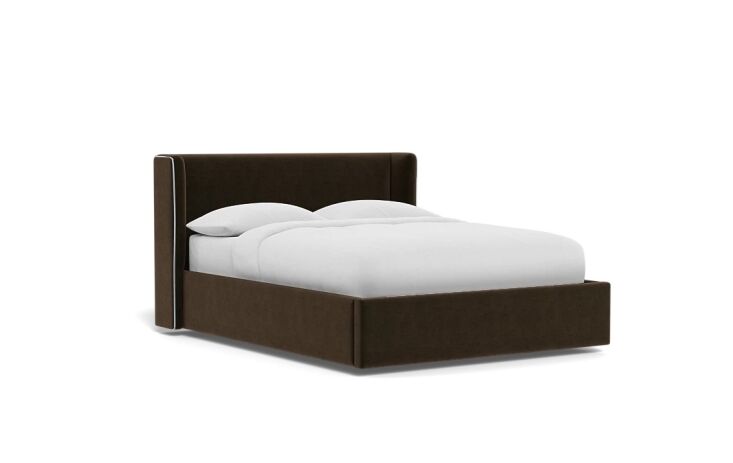 a luxe option: the graham upholstered bed with piping is available in a slew of 23