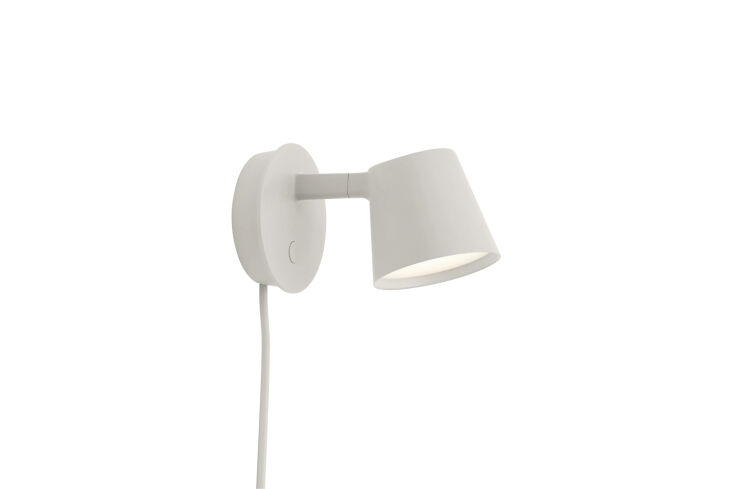 designed by jens fager for muuto, the tip wall lamp in grey, white, or black is 18
