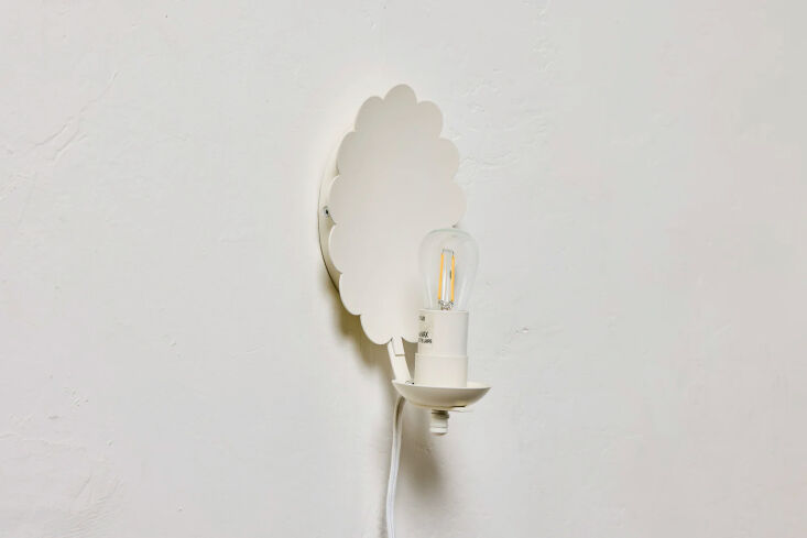 the nickey kehoe scallop plug in sconce has a characterful backplate; \$5\25 fo 17