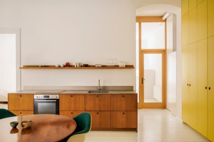 this bespoke reform kitchen—with wooden cabinet fronts and a brushed steel co 24