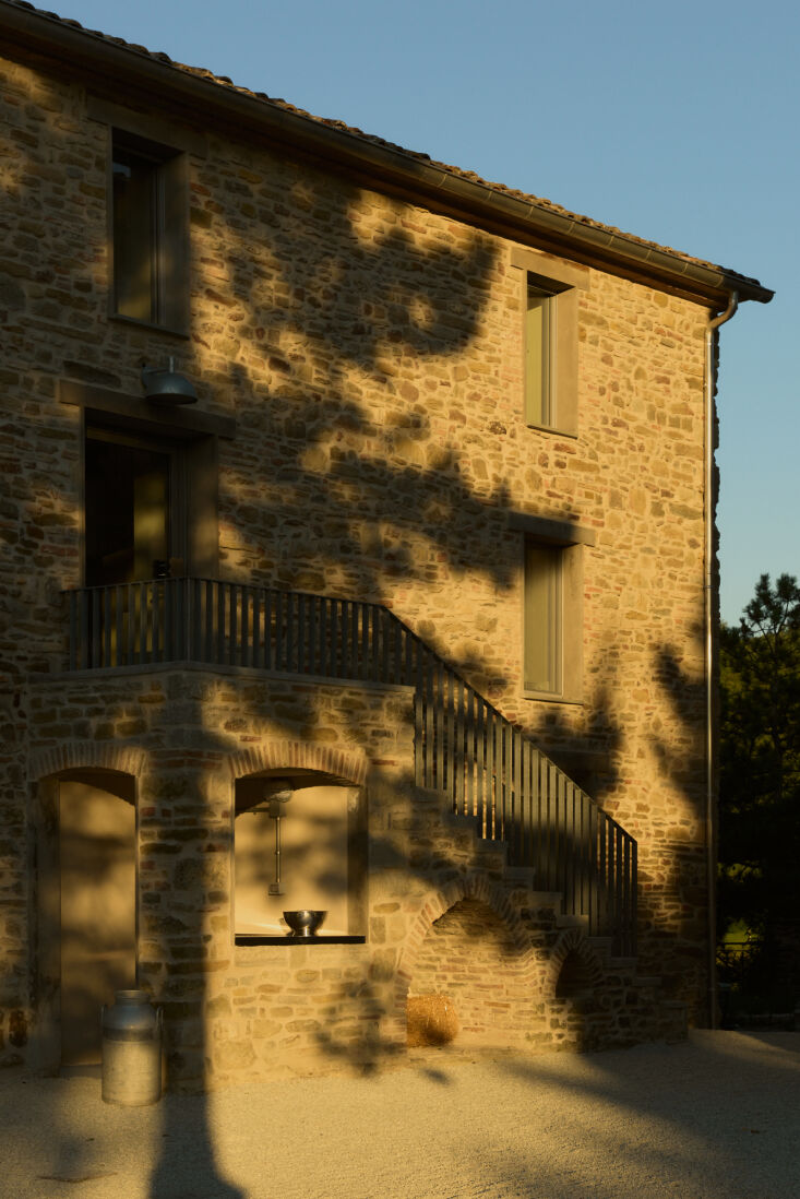 stairways, both exterior and interior, were restored along with windows and doo 18