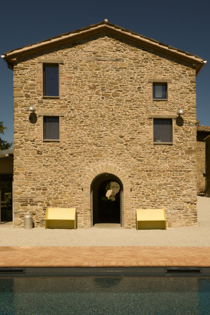 entering locanda scavolo from the pool are two coimbra 0\2 benches from ripa de 17