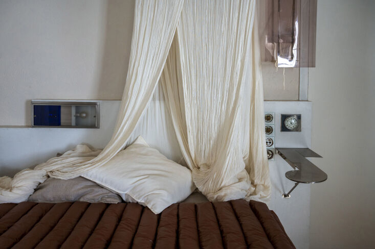 in the bedroom, gray designed a light box built into the headboard. it has two  26