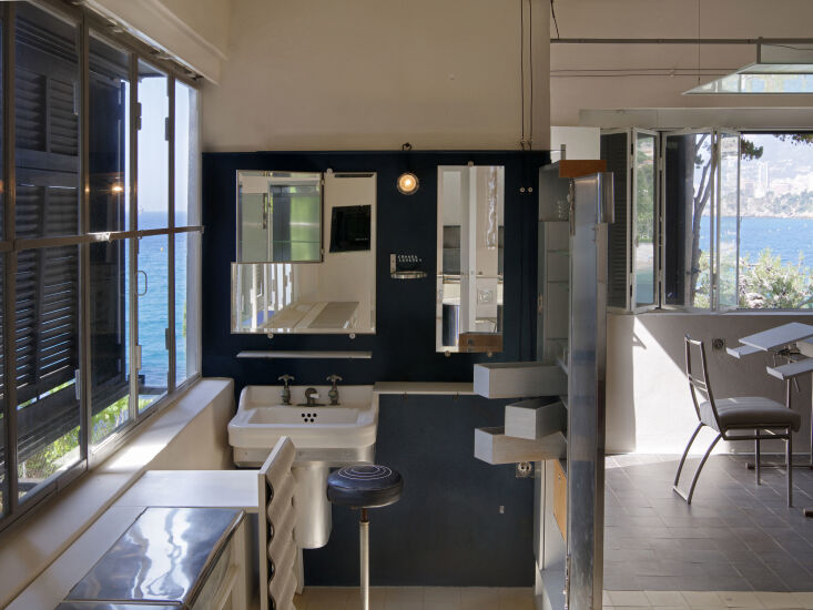 in the bathroom and the living room, gray designed clever swivel drawers that o 28