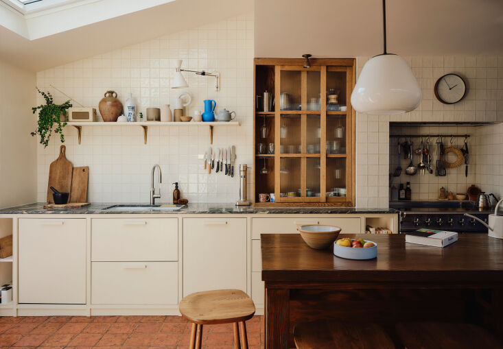 the unpretentious kitchen is housed in the new rear extension. the cabinets are 19