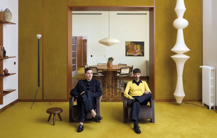 farresin and trimarchi sit in their apartment renovated in a spectrum of yellow 17