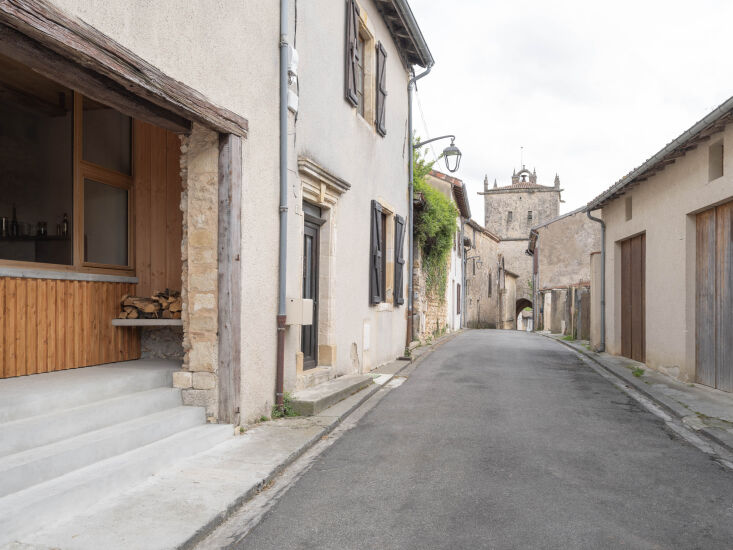 on the street, the entry is set back from the façade to create a shallow loggi 17