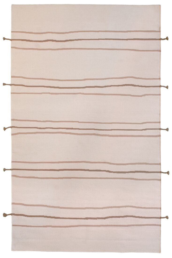 reya is edged with tassels that extend its stripes. 20