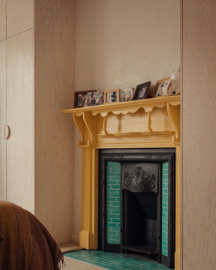an original fireplace—previously white, now painted an edward bulmer brillian 26