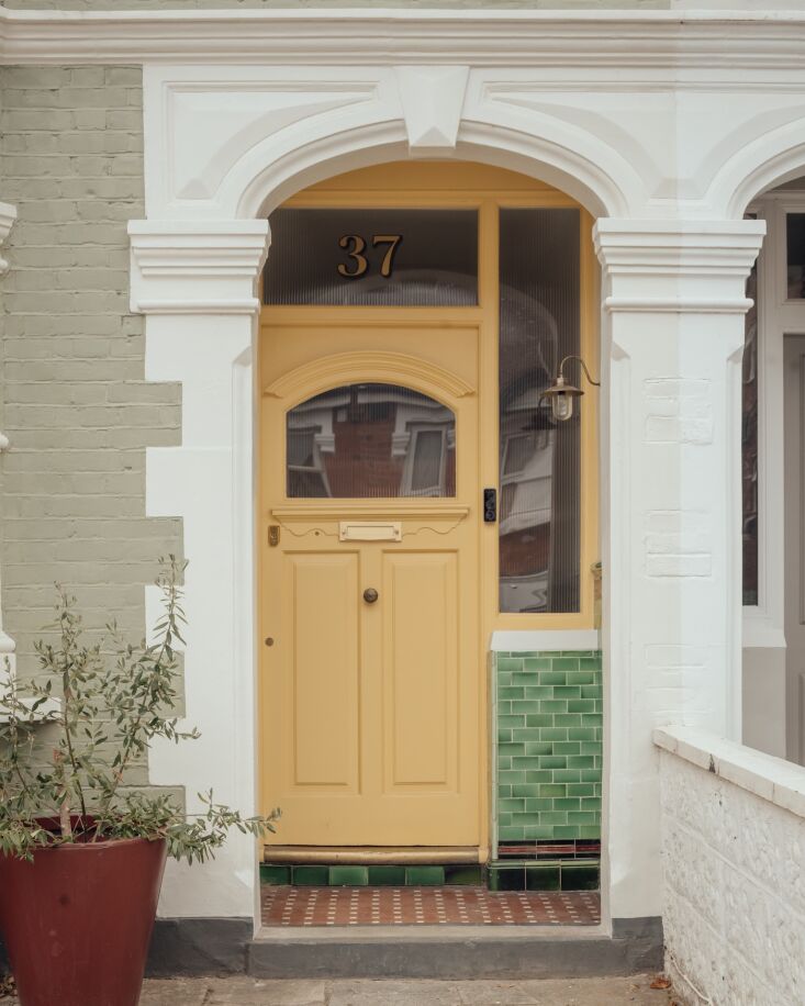 the  period front door and glazed tiling were restored and the exterior is now 18