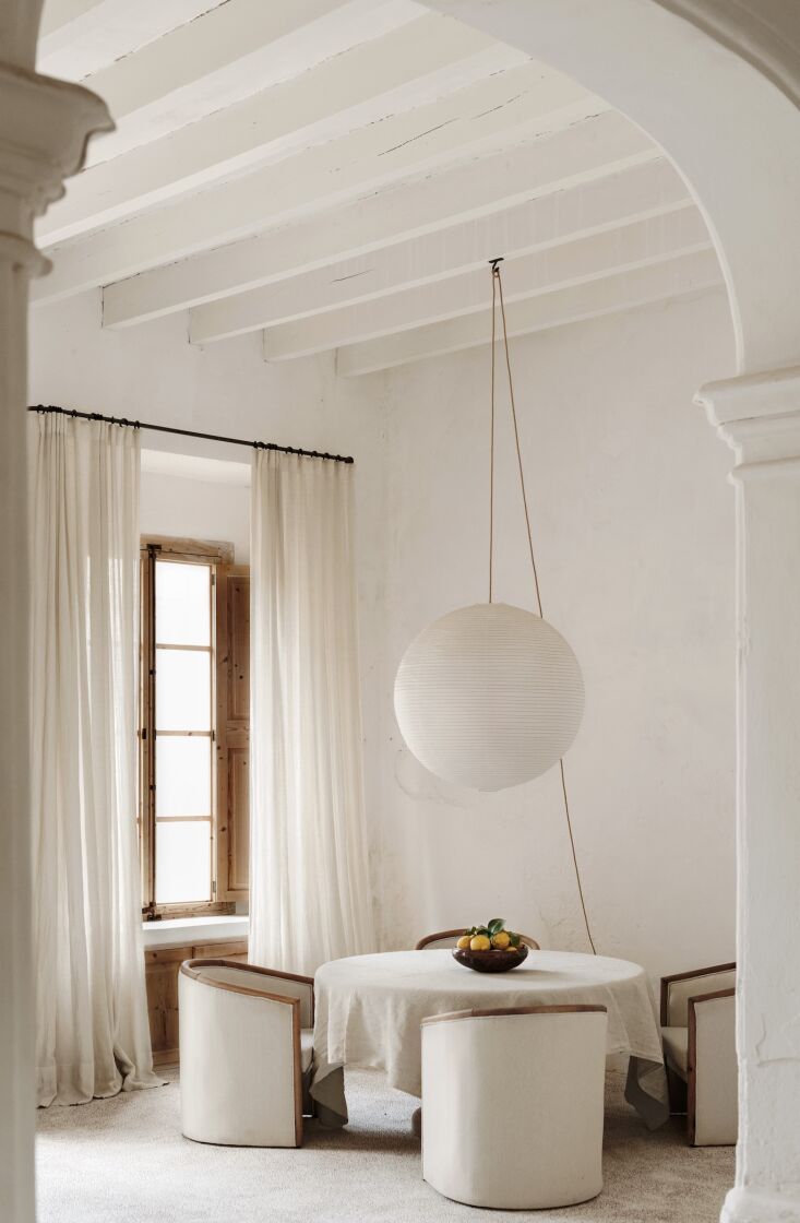 the entry opens to a small indoor dining area. the couple preserved the layout 19