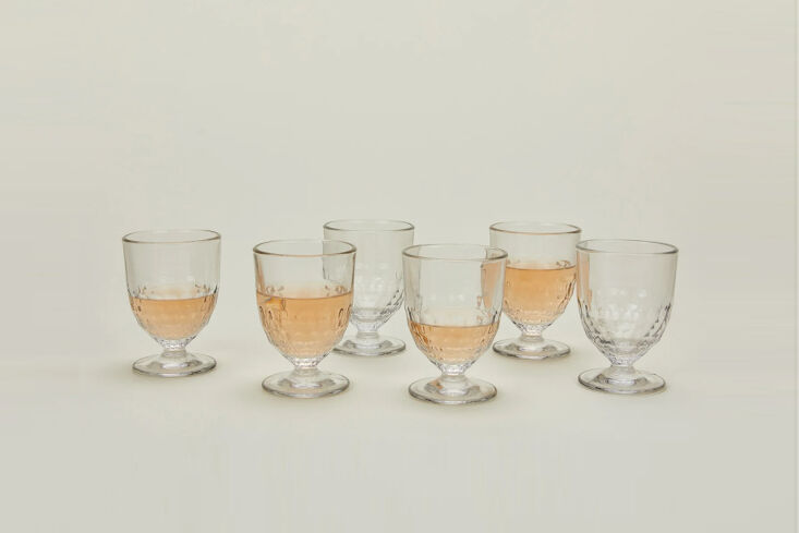 by french co. la rochere, a set of six artois wine glasses is \$65 from hawkin 23