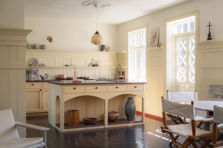 the kitchen is brought to life through a considered palette of pale yellows—8 18