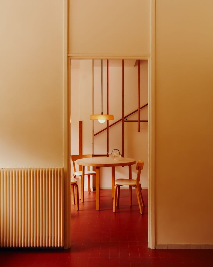 brick, oak, copper, and plaster are chosen for their tactile warmth and their a 23