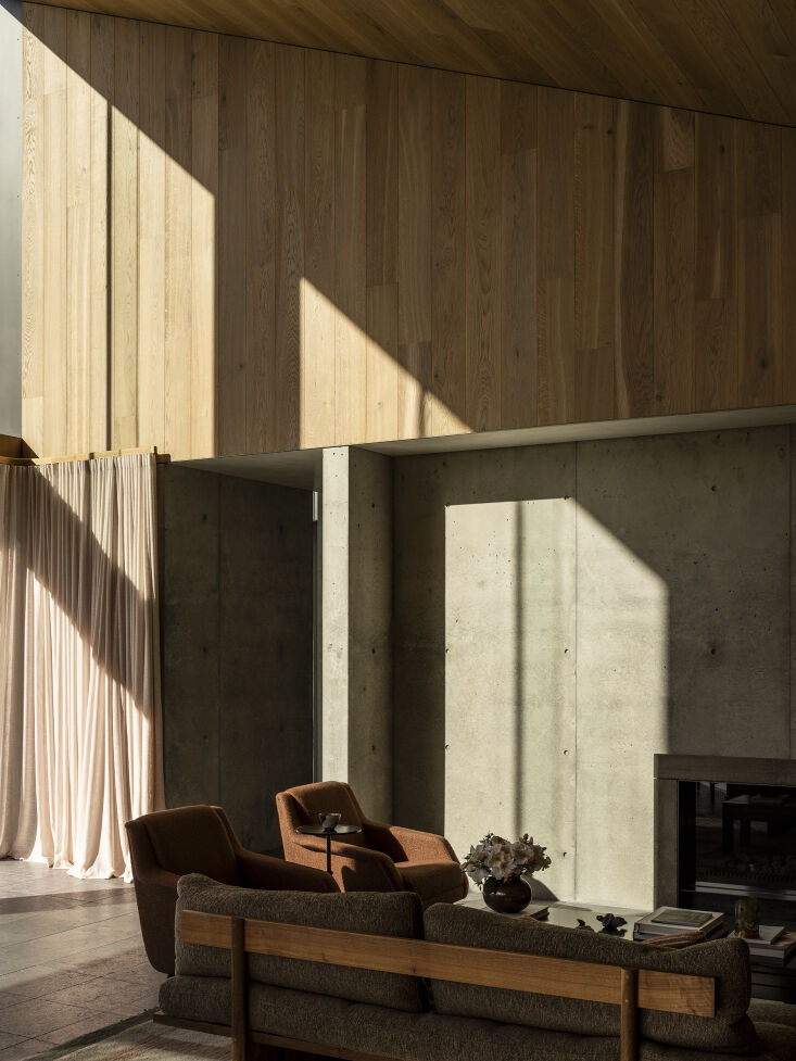 the armchairs are the cdc\1 lounge chair by carlo de carli for gubi. the side t 20