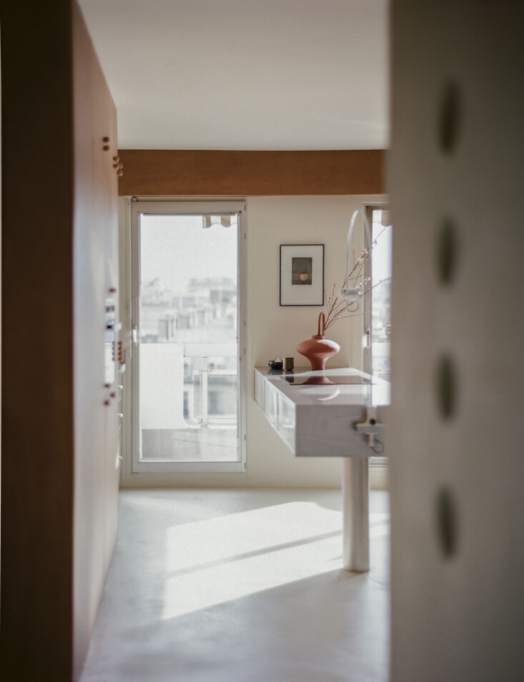 the ninth floor apartment opens into an expansive kitchen, dining, and living s 17