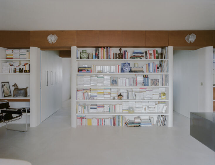 two openings lead to separate bedrooms—a main bedroom and children\2\1 23