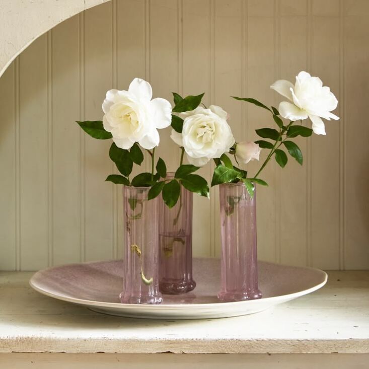 tulip bud vases, \$\19 each, are mouth blown in india from 60 percent recycled  19