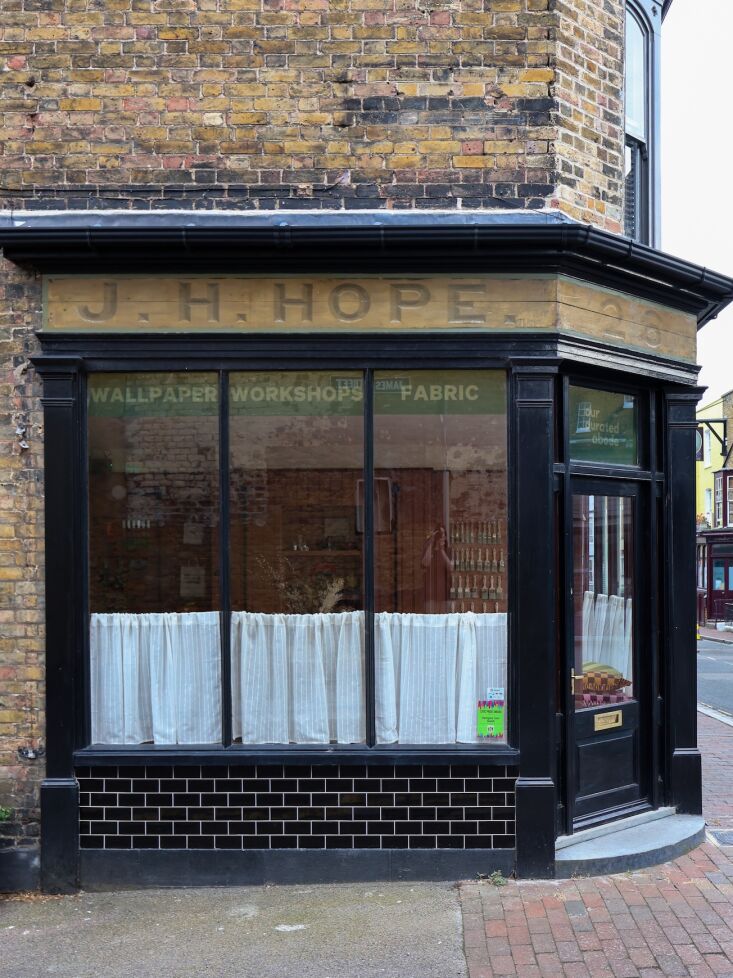 our curated abode occupies an old retail space with a charming exterior. 17