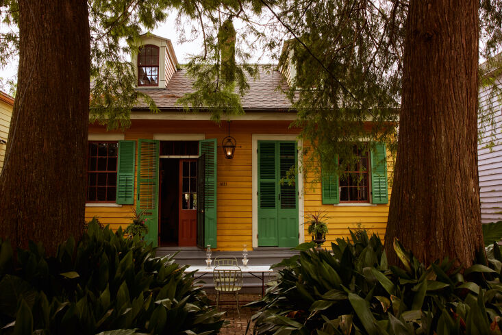 the cottage, with sweet green shutters. it\2\17;s tucked behind a tropic 17