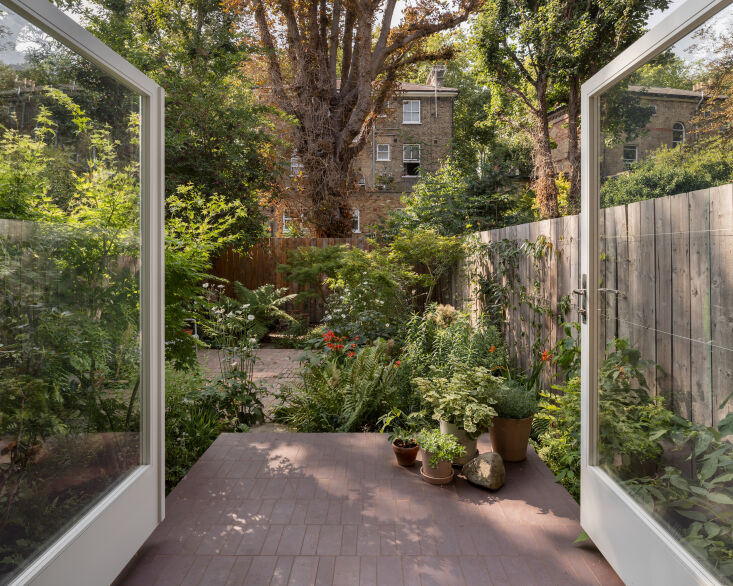 in the backyard, jody and amalia recycled old materials that they no longer nee 25