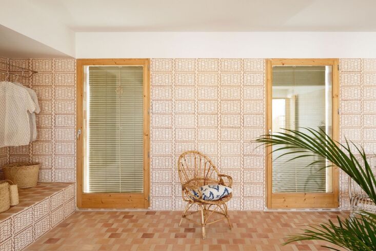 an open closet is masterfully incorporated into the pattern on pattern. the syn 22