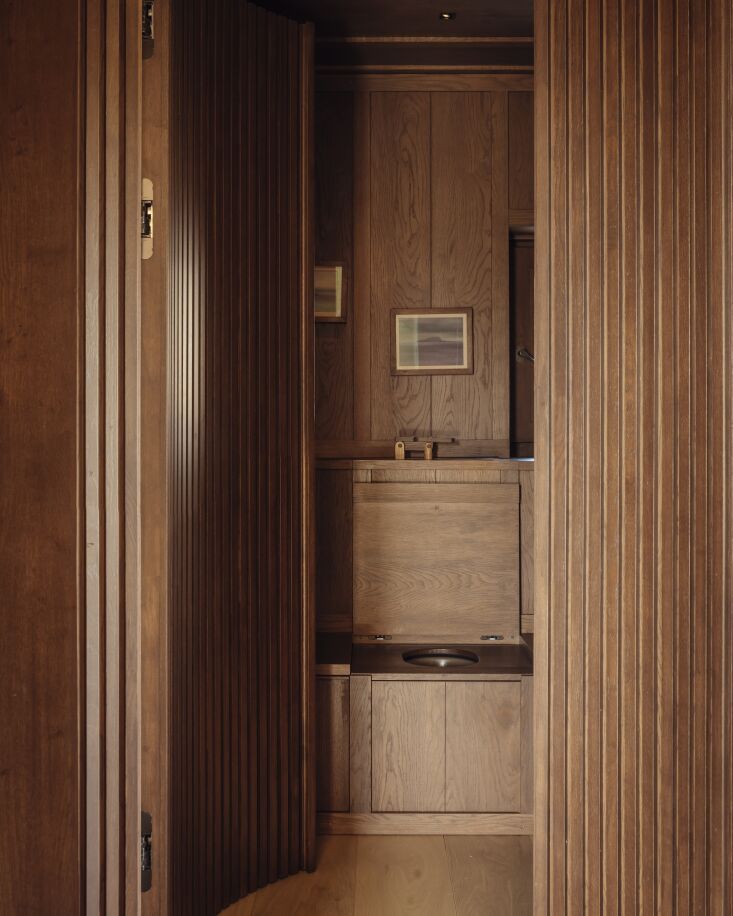 a wc made of chestnut joinery. 29